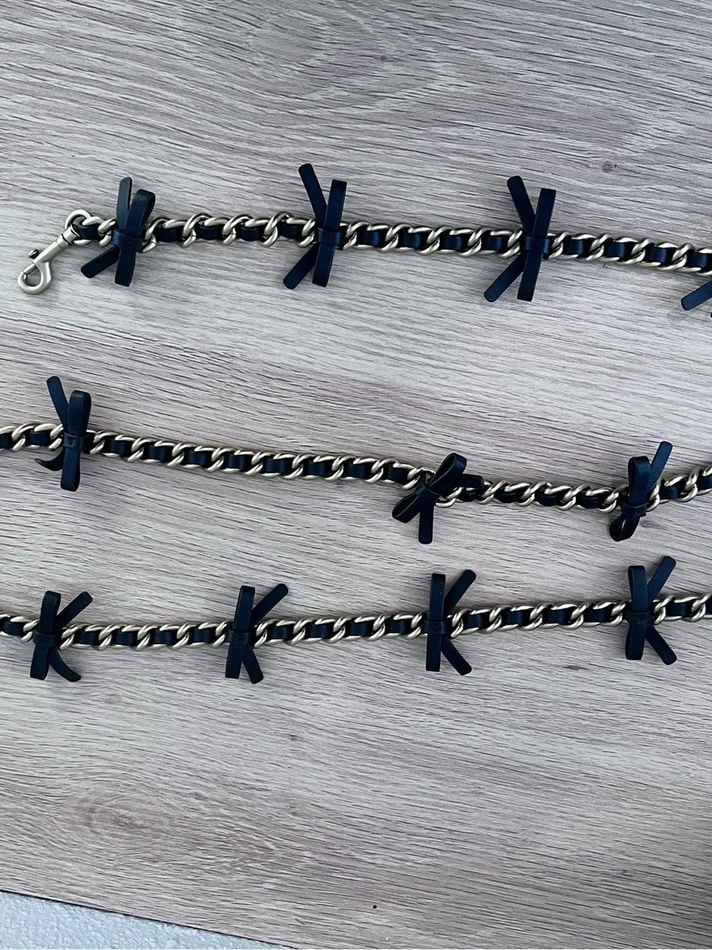 Coach Black and Gold leather bow strap